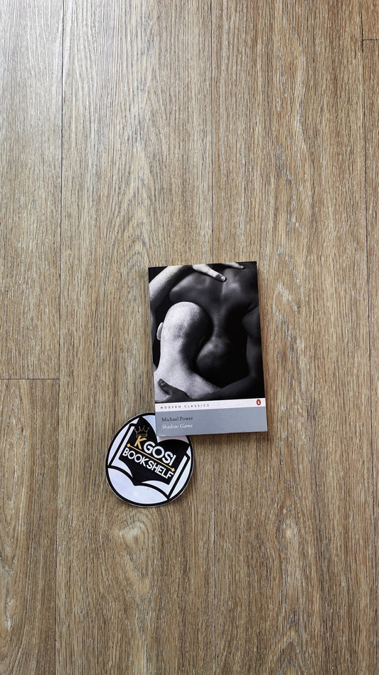 Shadow Game book on wooden floor 